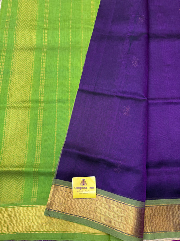 Wine with Green , Rich Floral Zari butta in the body , Traditional Borders and Rich Pallu Silk Cotton Saree
