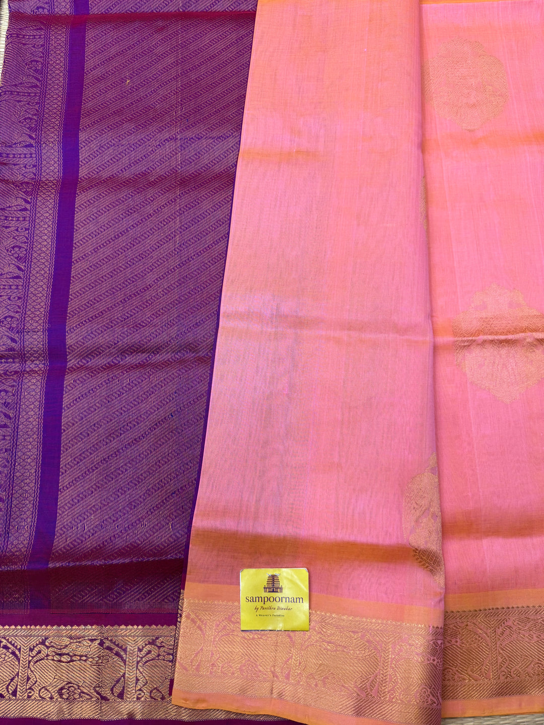 Peachish Pink with Magenta   ,  Rich Gandaberunda  Zari butta in the body , Traditional Borders and Rich Pallu Silk Cotton Saree