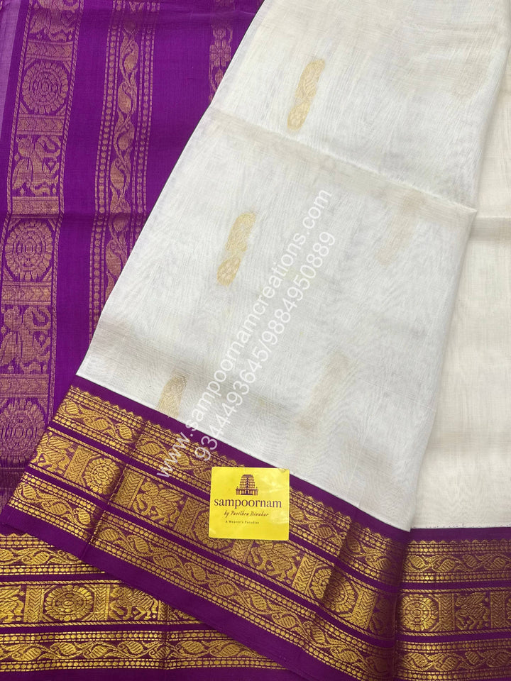 Offwhite with Dark Magenta , Mayil Zari butta in the body , traditional border and Grand Pallu Korvai Silk Cotton Saree