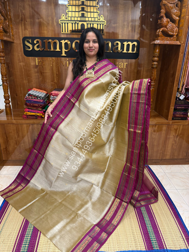 Dark Beige with Dark Magenta , rich Zari butta in the body , Rettapet border and Grand Pallu Korvai Silk Cotton Saree