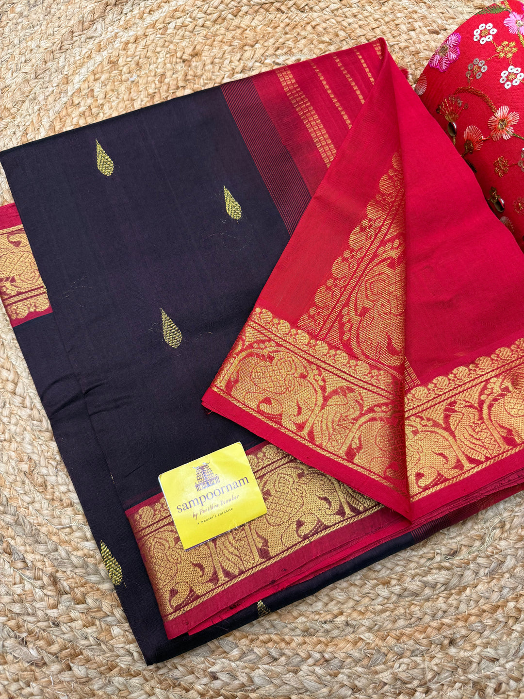 Dark Brown with Red  ,  Rich Tilakam Zari butta in the body , Traditonal Borders and  Rich Pallu Silk Cotton Saree