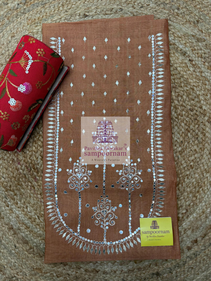 Mustard with  Pitan work in the Yoke , Plain bottom and Ikkat Printed Dupatta