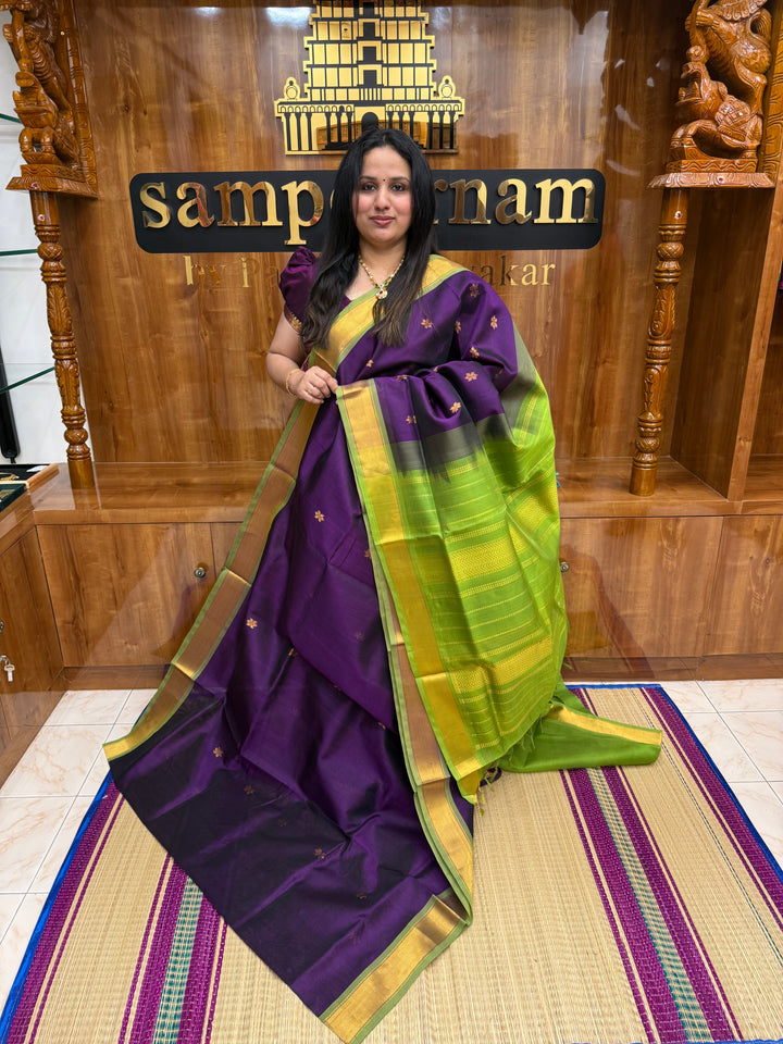Wine with Green , Rich Floral Zari butta in the body , Traditional Borders and Rich Pallu Silk Cotton Saree