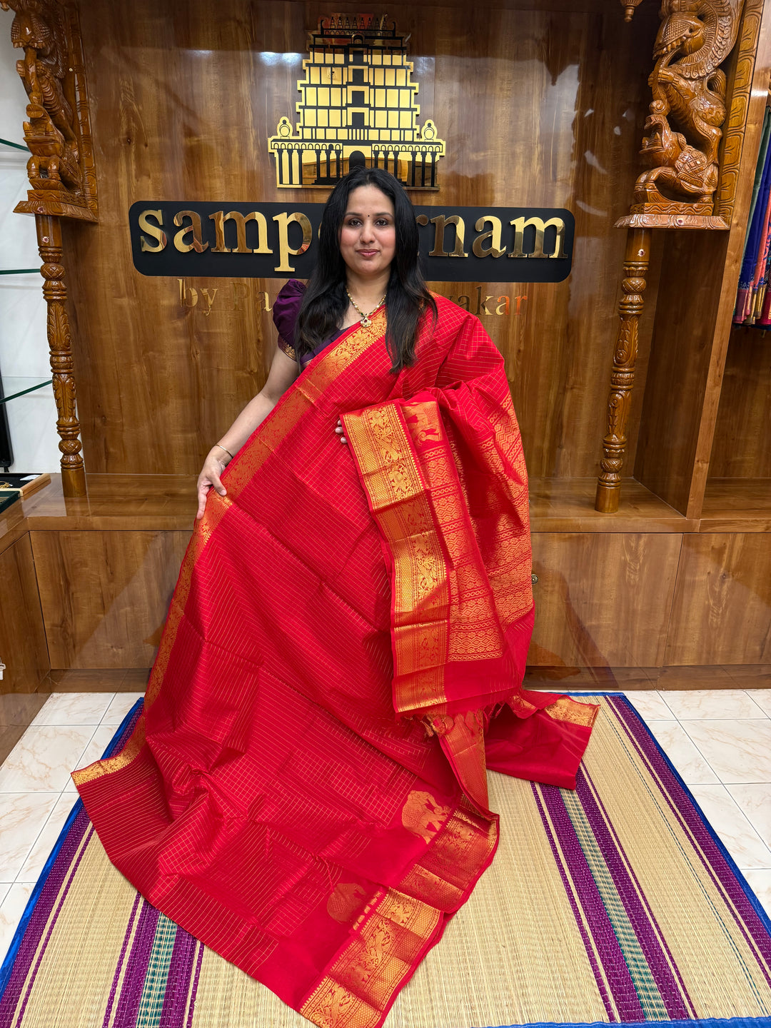 Classic Red with , Elegant Elephant Zari butta in the borders , Zari checks in the body and rich Pallu Silk Cotton Saree