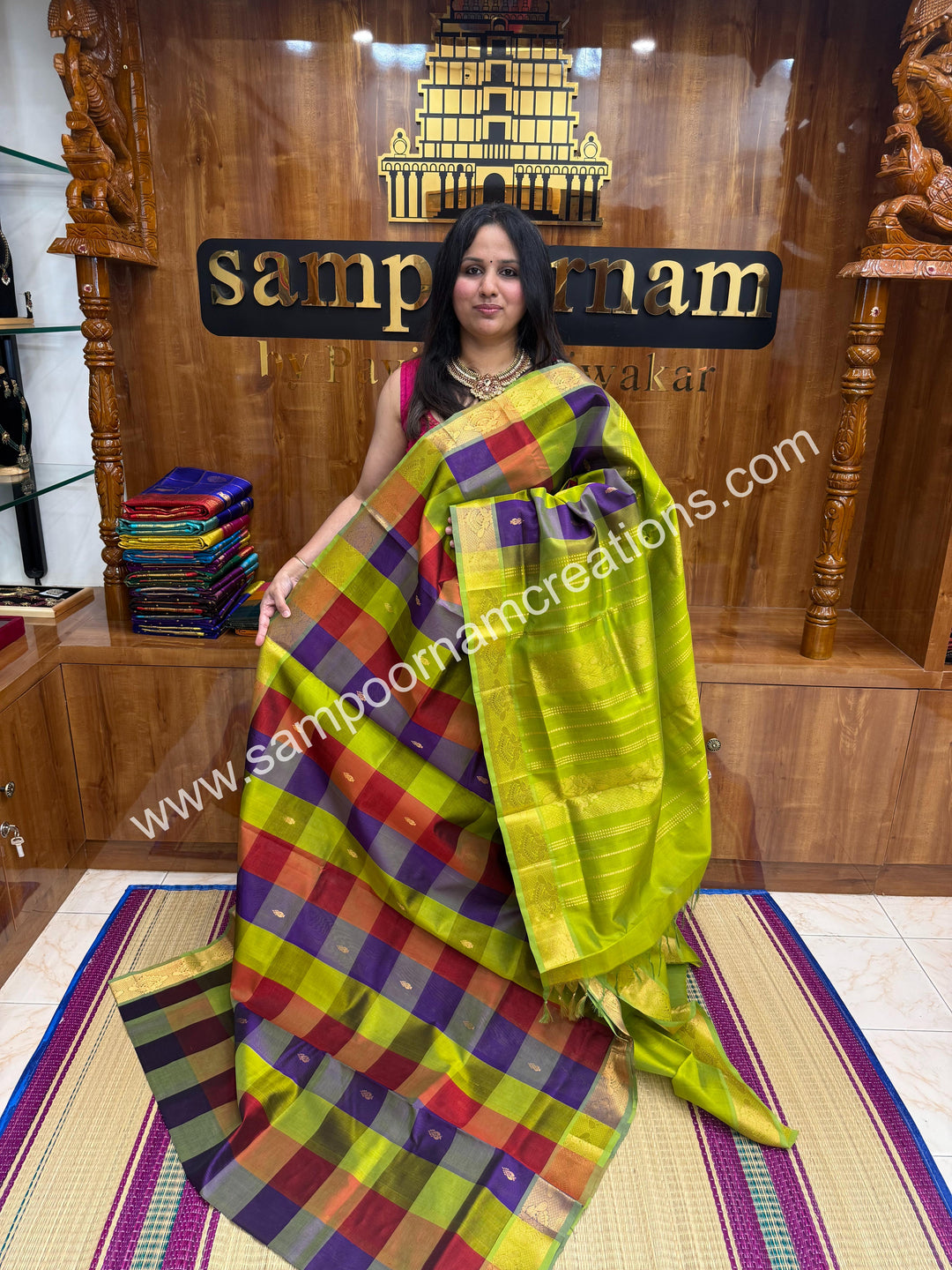 Maroon , Purple , Green with Green , Pallum Pazham Checks with rich butta , traditional borders and rich Pallu Silk Cotton Sarees