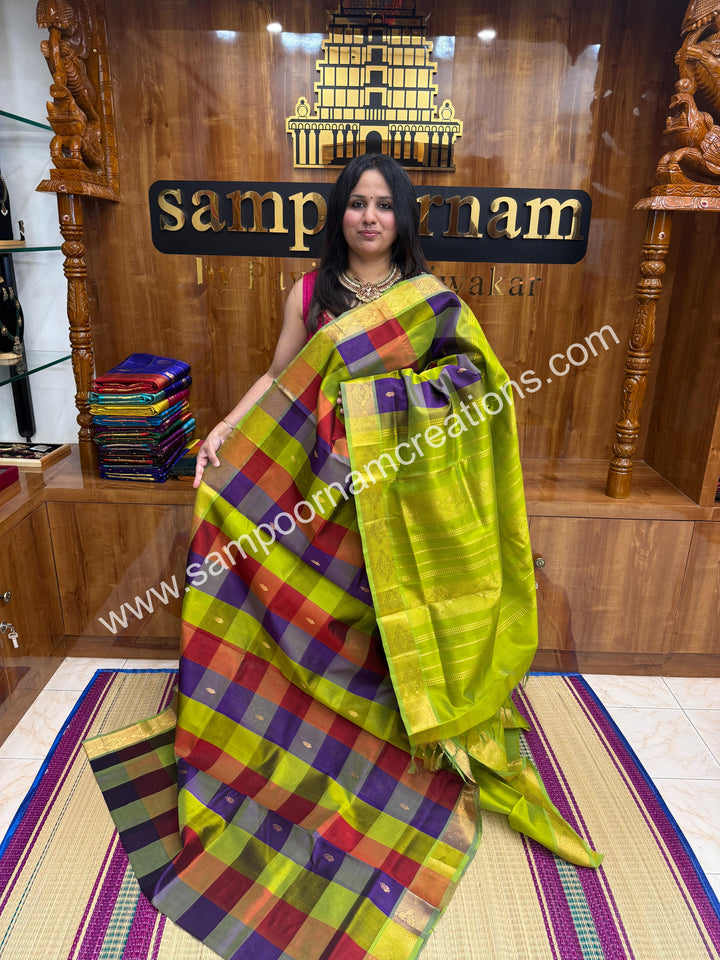 Maroon , Purple , Green with Green , Pallum Pazham Checks with rich butta , traditional borders and rich Pallu Silk Cotton Sarees