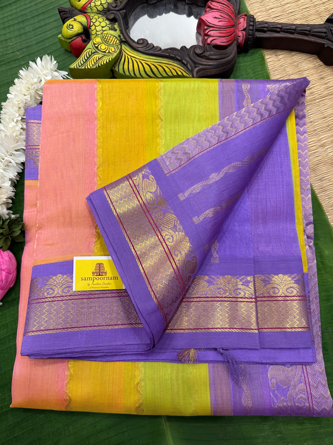 A Fusion of colours Pastel Pink , Yellow and Green with Lavender , traditional borders and rich Pallu Korvai Silk Cotton Saree