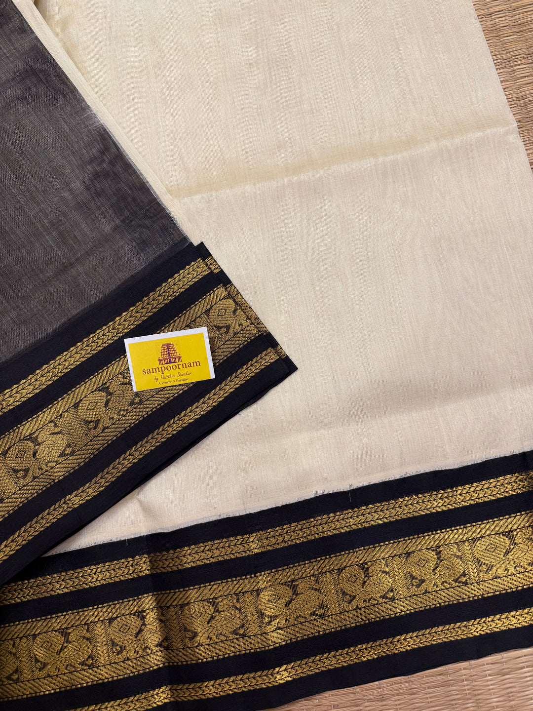 White with Black , traditional Kanchi borders  and rich Pallu  Korvai Silk Cotton Saree
