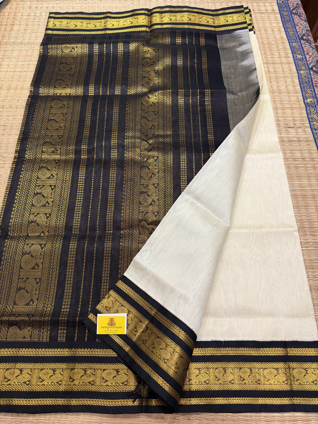 White with Black , traditional Kanchi borders  and rich Pallu  Korvai Silk Cotton Saree