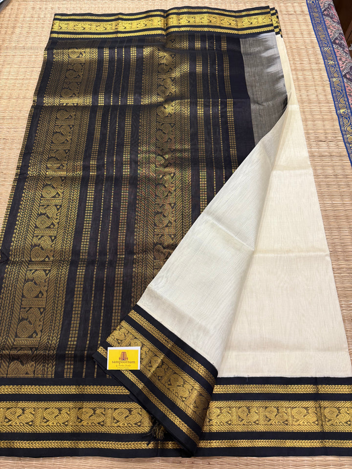 White with Black , traditional Kanchi borders  and rich Pallu  Korvai Silk Cotton Saree