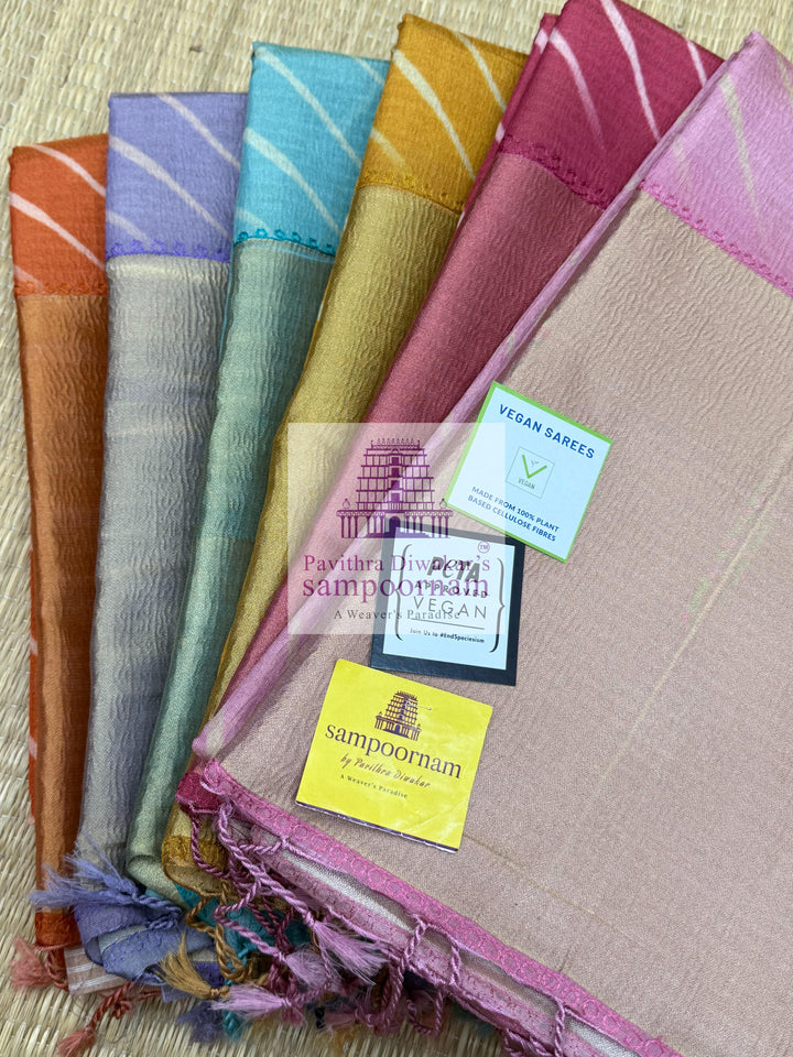 Lilac with Lehariya prints and small embroided mirror work in the body and border, tissue borders and pallu, VEGAN Saree