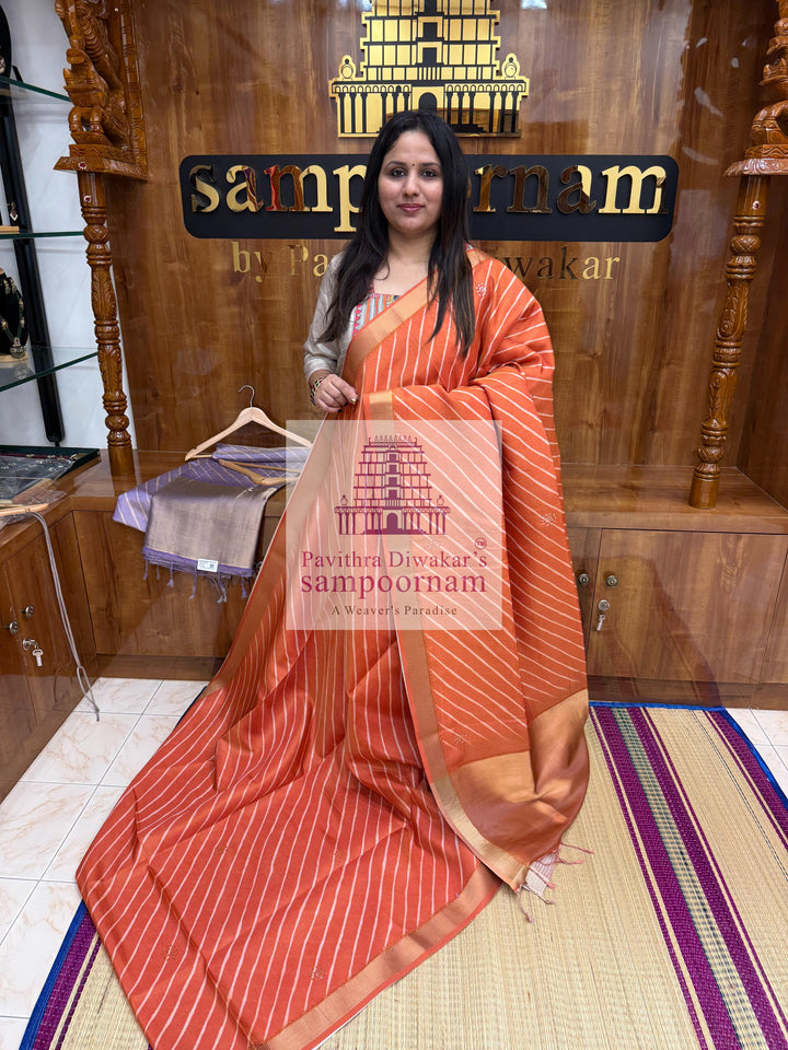 Rust Orange Deep Red with Lehariya prints and small embroided mirror work in the body and border, tissue borders and pallu, VEGAN Saree