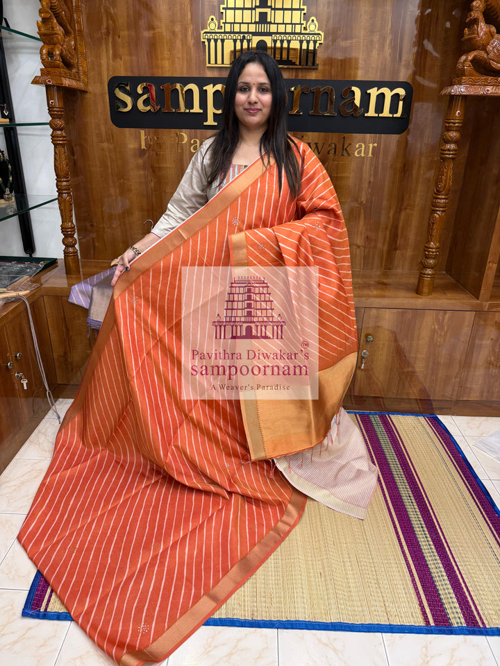 Rust Orange Deep Red with Lehariya prints and small embroided mirror work in the body and border, tissue borders and pallu, VEGAN Saree