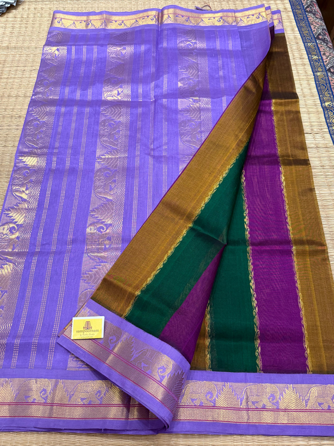 A Fusion of colours Green , Purple and Vendhayam with Lavender , traditional borders and rich Pallu Korvai Silk Cotton Saree