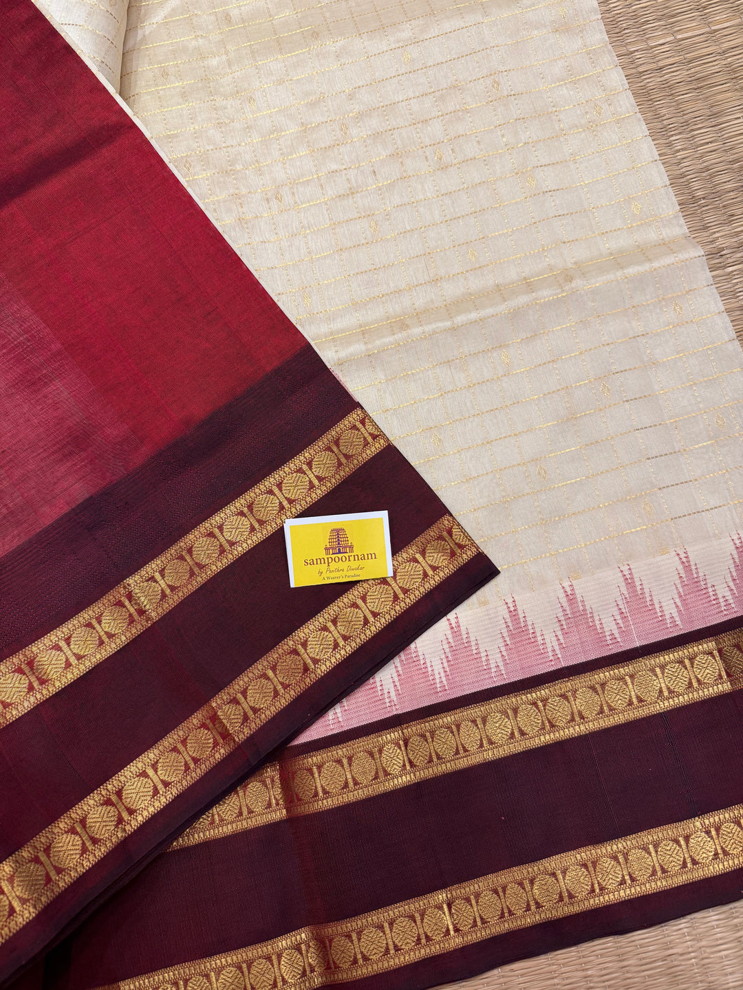 Offwhite with Dark Maroon , traditional rettapet border ,Zari kattam in the body with Zari butta , rich Pallu  Korvai Silk Cotton Saree