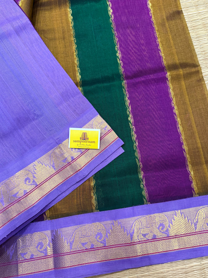A Fusion of colours Green , Purple and Vendhayam with Lavender , traditional borders and rich Pallu Korvai Silk Cotton Saree