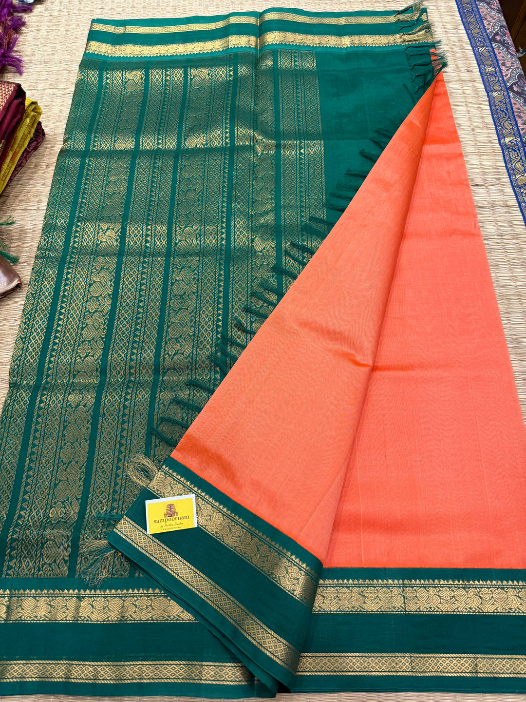 Kanakambaram with Green , traditional Kanchi borders  and rich Pallu  Korvai Silk Cotton Saree