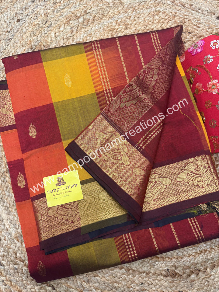 Maroon ,Orange, Manjal with Maroon, Pallum Pazham Checks with rich butta , traditional borders and rich Pallu Silk Cotton Sarees
