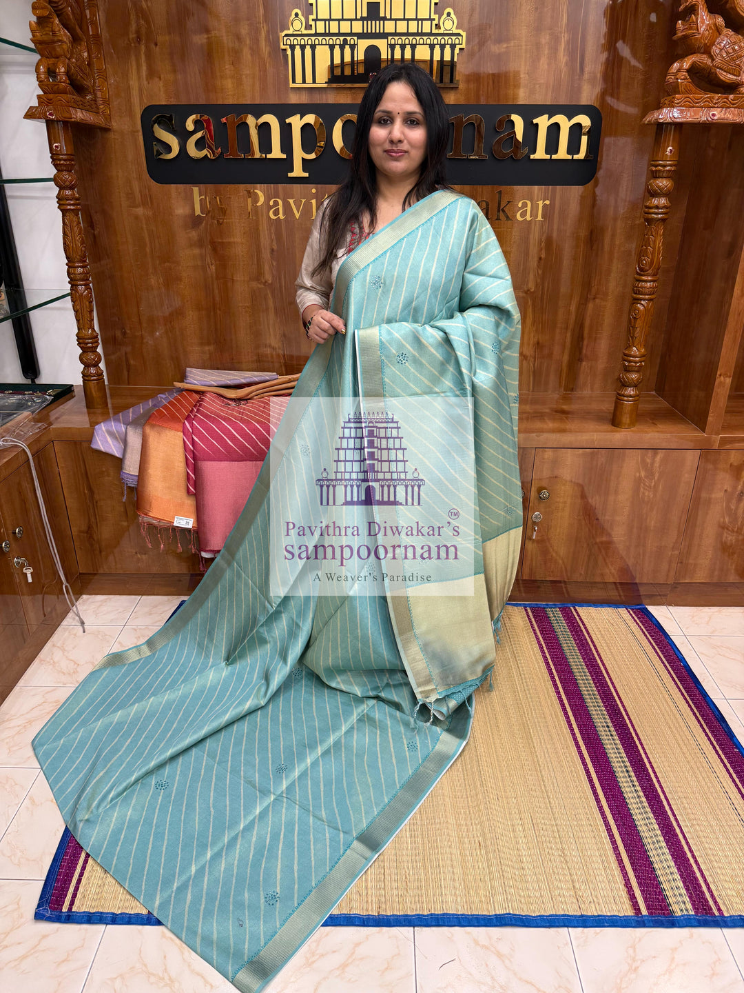 Turquoise Blue with Lehariya prints and small embroided mirror work in the body and border, tissue borders and pallu, VEGAN Saree