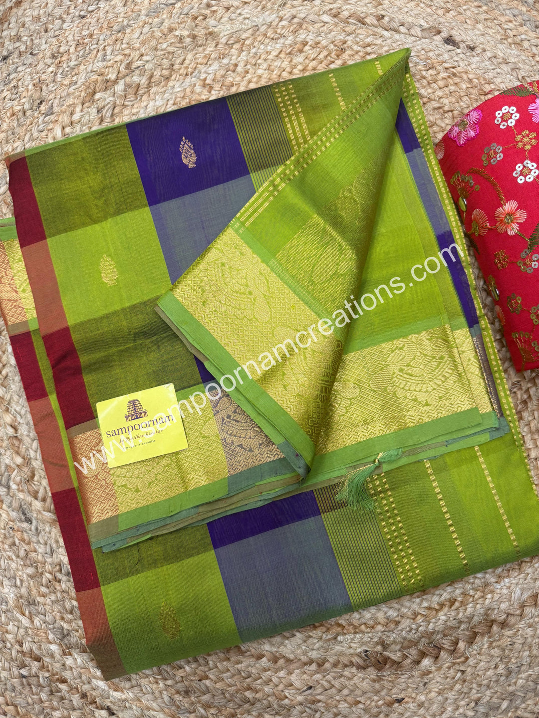 Maroon , Purple , Green with Green , Pallum Pazham Checks with rich butta , traditional borders and rich Pallu Silk Cotton Sarees