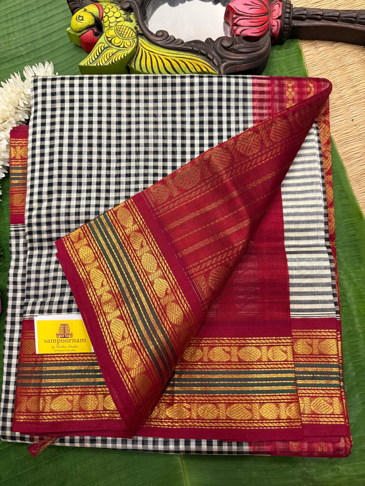 Black and White Podi Kattam with Red, traditional borders and rich Pallu Korvai Silk Cotton Saree