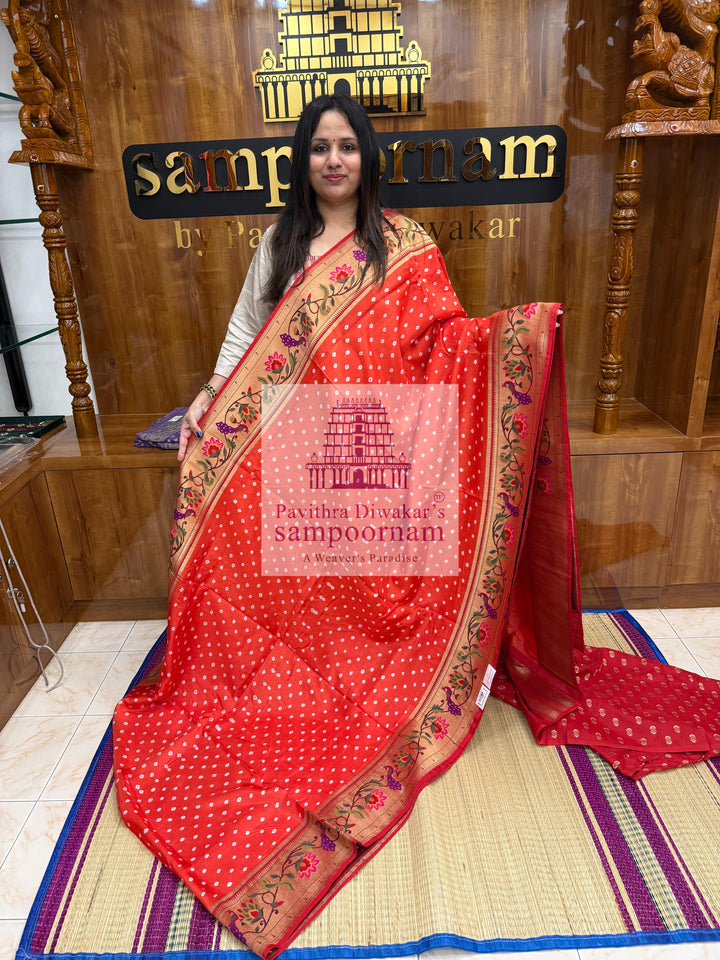 Sunset Orange With Red , Bandhini prints in the body , with Paithani rich Zari borders and Pallu , Banarasi blouse , Pure Vegan Silk Saree