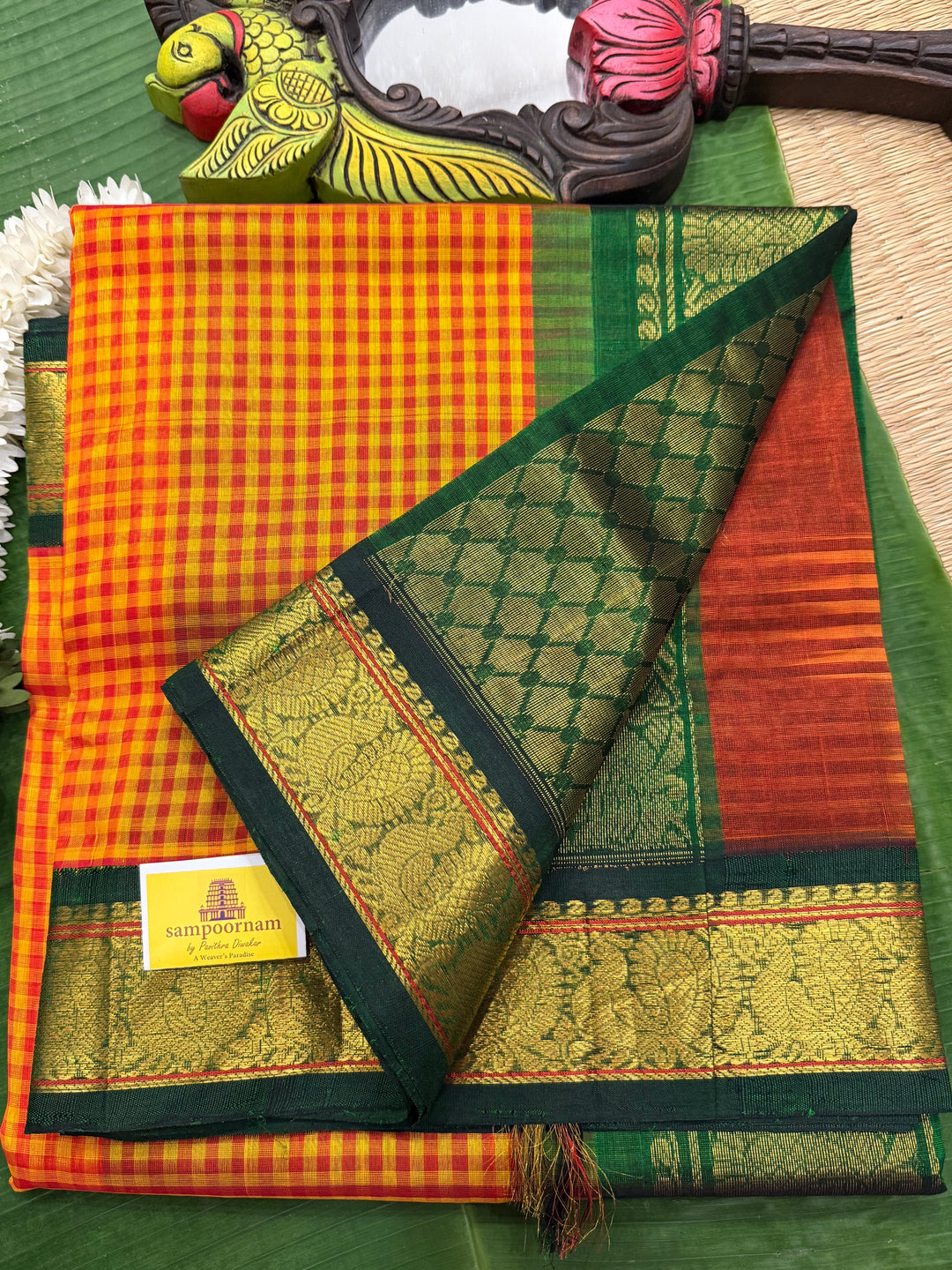 Manjal and Red Podi Kattam with Green , traditional borders and rich Pallu Korvai Silk Cotton Saree