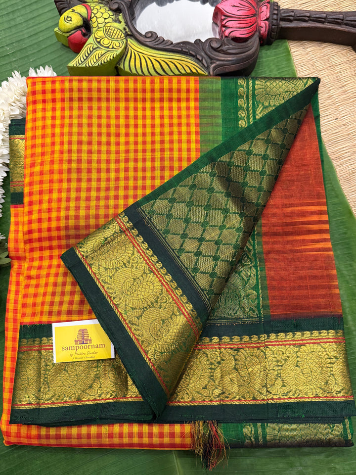 Manjal and Red Podi Kattam with Green , traditional borders and rich Pallu Korvai Silk Cotton Saree