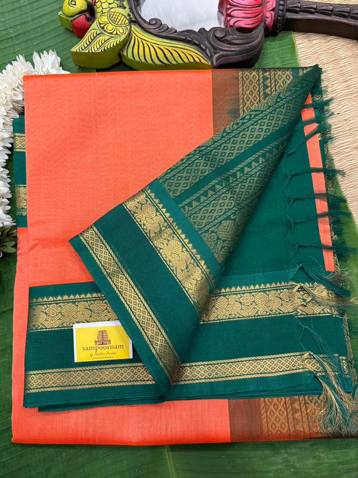 Kanakambaram with Green , traditional Kanchi borders  and rich Pallu  Korvai Silk Cotton Saree