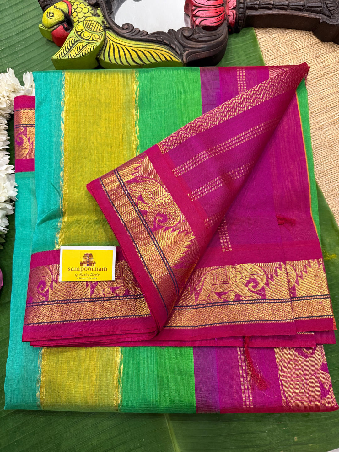 A Fusion of colours shades of Green and Blue with Magenta  , traditional borders and rich Pallu Korvai Silk Cotton Saree