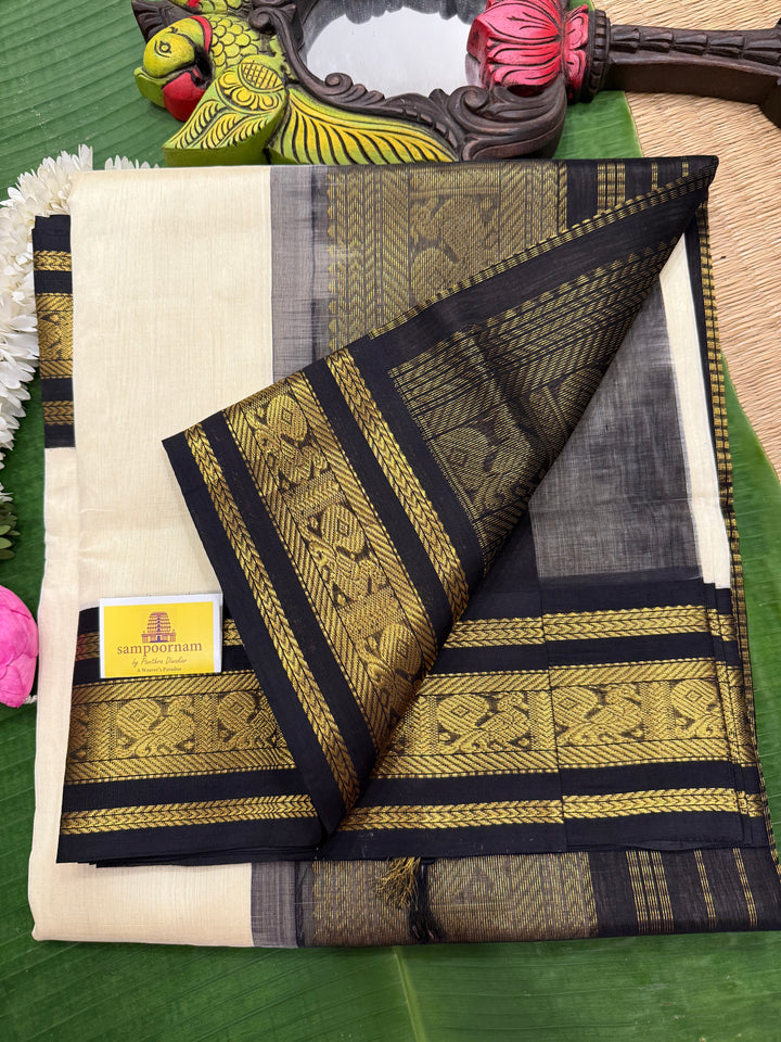 White with Black , traditional Kanchi borders  and rich Pallu  Korvai Silk Cotton Saree