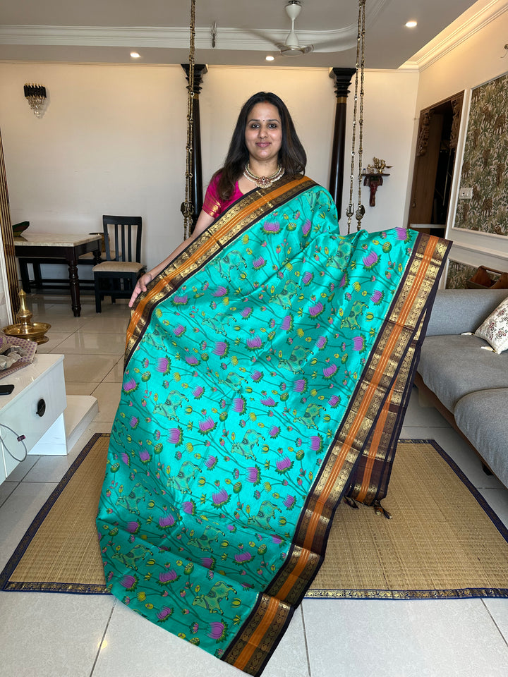 Ramar Blue with Brown Traditional Rudraksh Border Pichwai Printed Korvai Silk Cotton Saree