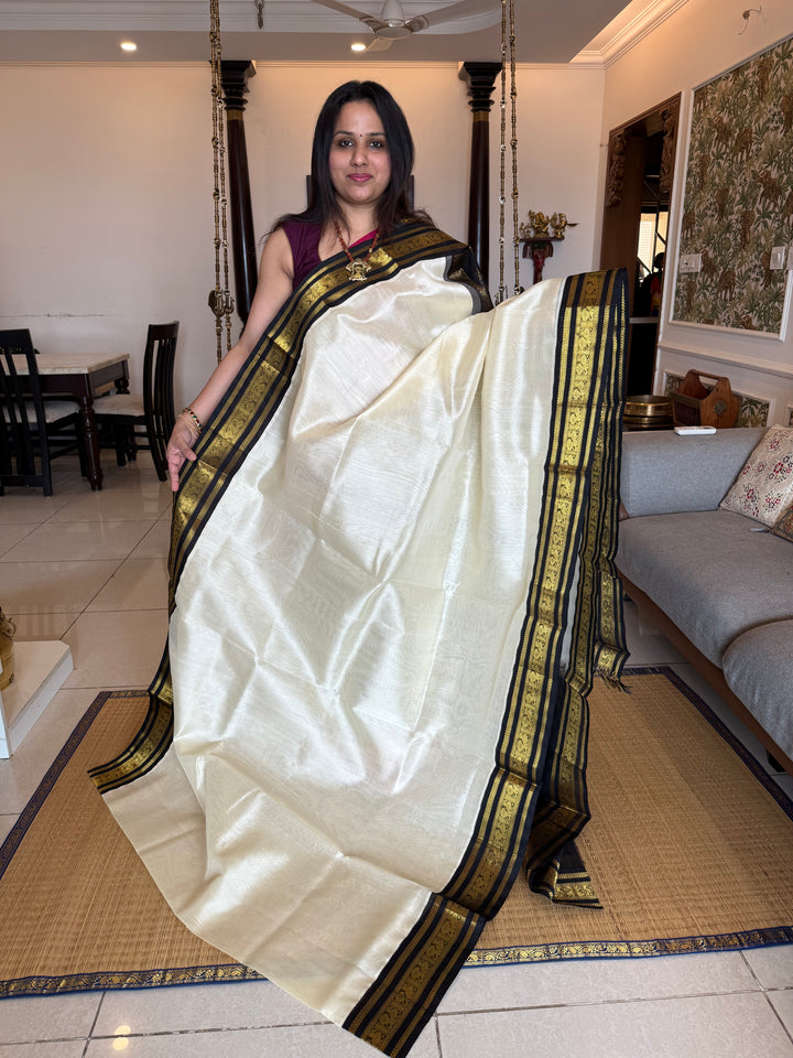 White with Black , traditional Kanchi borders  and rich Pallu  Korvai Silk Cotton Saree