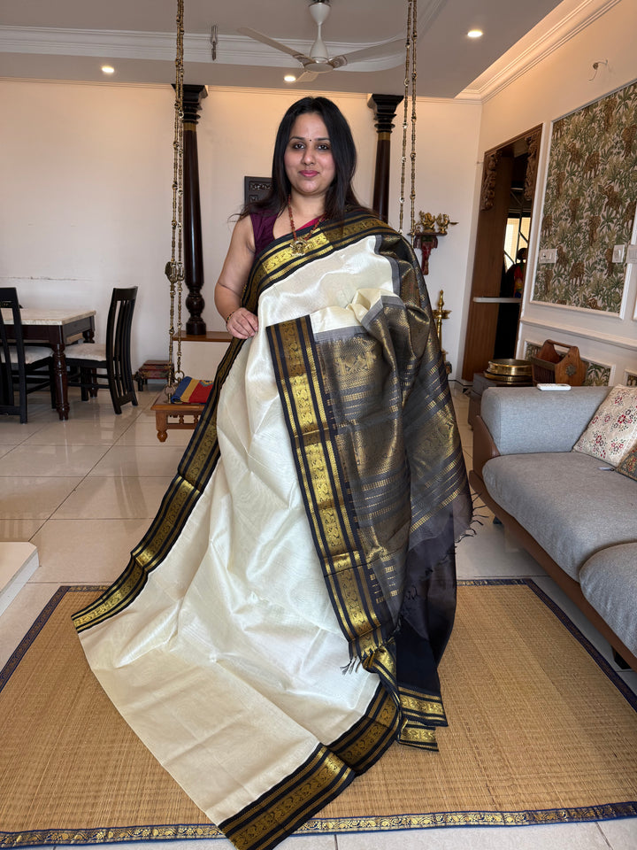 White with Black , traditional Kanchi borders  and rich Pallu  Korvai Silk Cotton Saree
