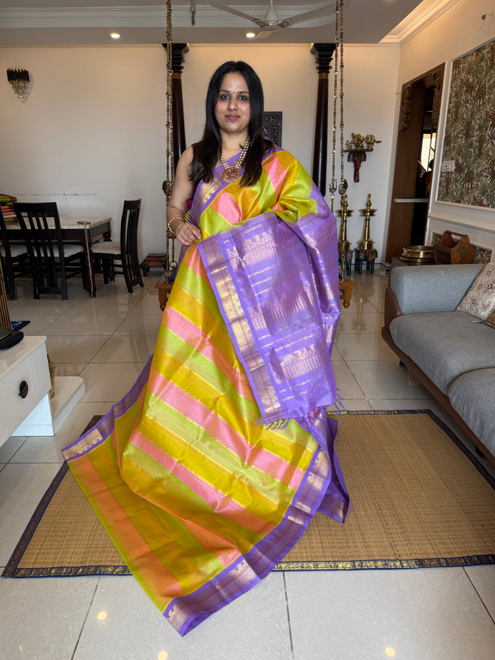 A Fusion of colours Pastel Pink , Yellow and Green with Lavender , traditional borders and rich Pallu Korvai Silk Cotton Saree