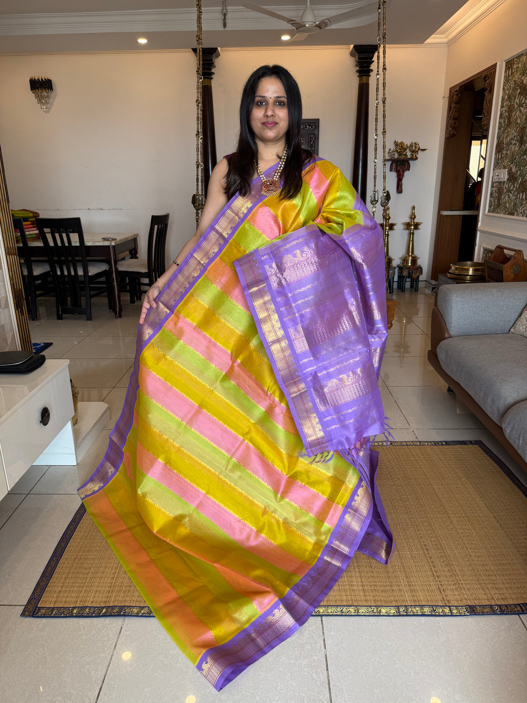 A Fusion of colours Pastel Pink , Yellow and Green with Lavender , traditional borders and rich Pallu Korvai Silk Cotton Saree