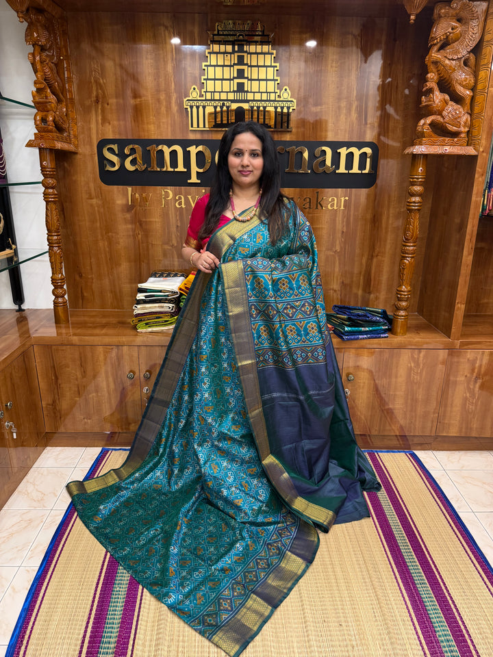 Aqua Blue with Green  , Pochampally inspired designs in the body and traditional Kanchi Pallu , Semi Pochampally Silk Saree