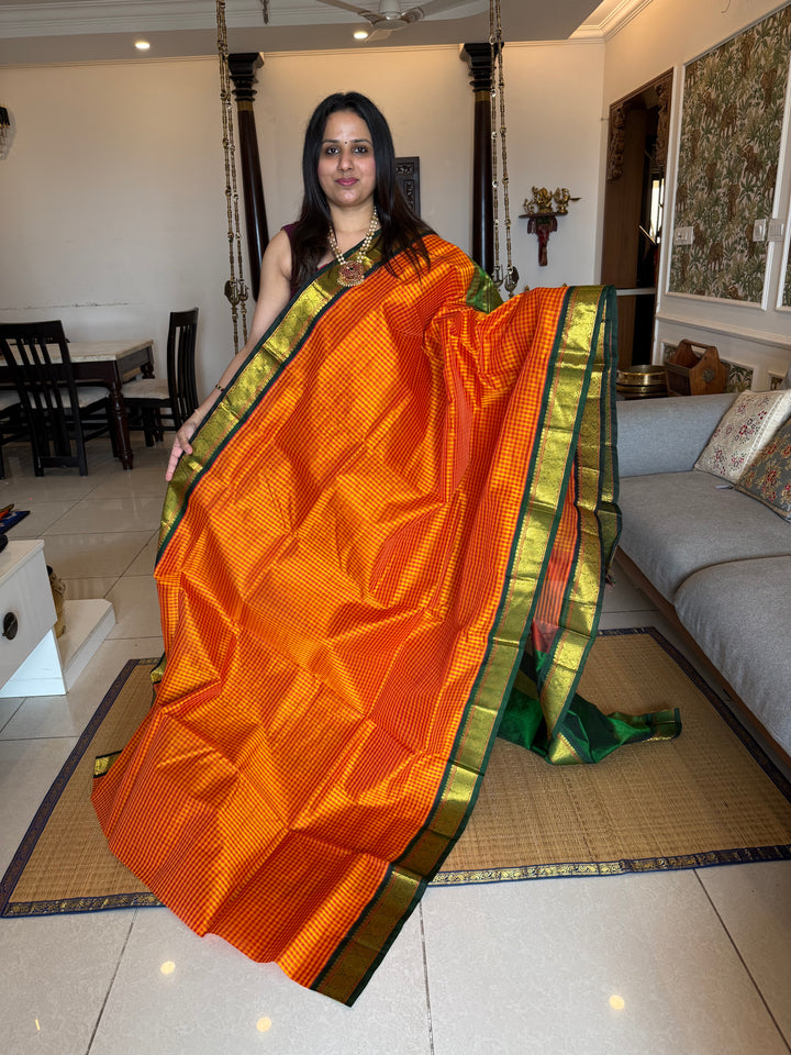 Manjal and Red Podi Kattam with Green , traditional borders and rich Pallu Korvai Silk Cotton Saree