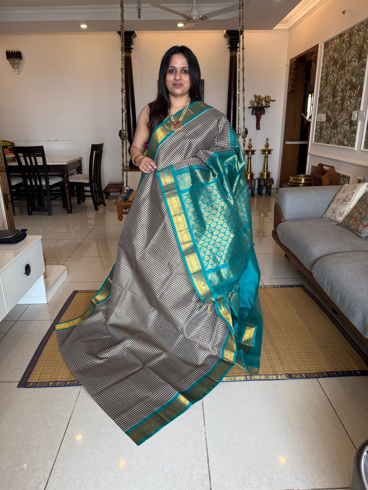 Black and White Podi kattam with Turquoise Blue , traditional borders and rich Pallu Korvai Silk Cotton Saree