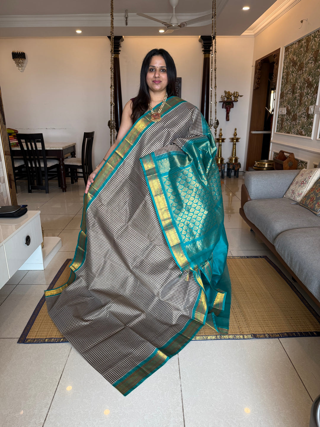 Black and White Podi kattam with Turquoise Blue , traditional borders and rich Pallu Korvai Silk Cotton Saree