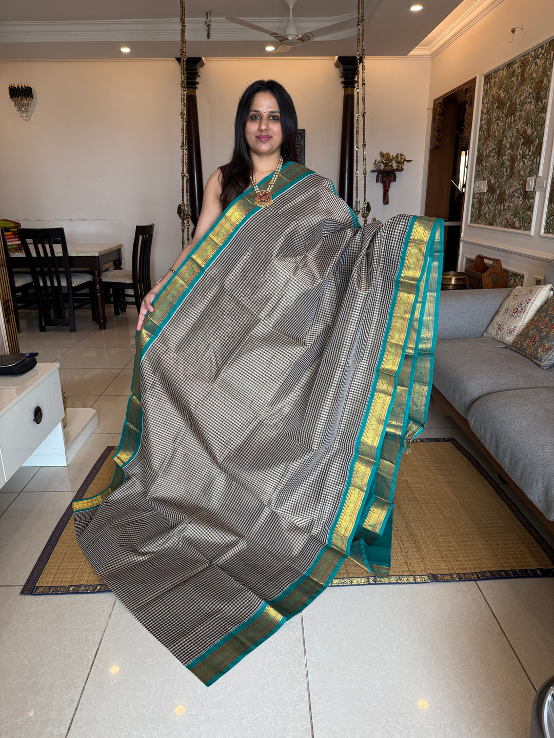 Black and White Podi kattam with Turquoise Blue , traditional borders and rich Pallu Korvai Silk Cotton Saree