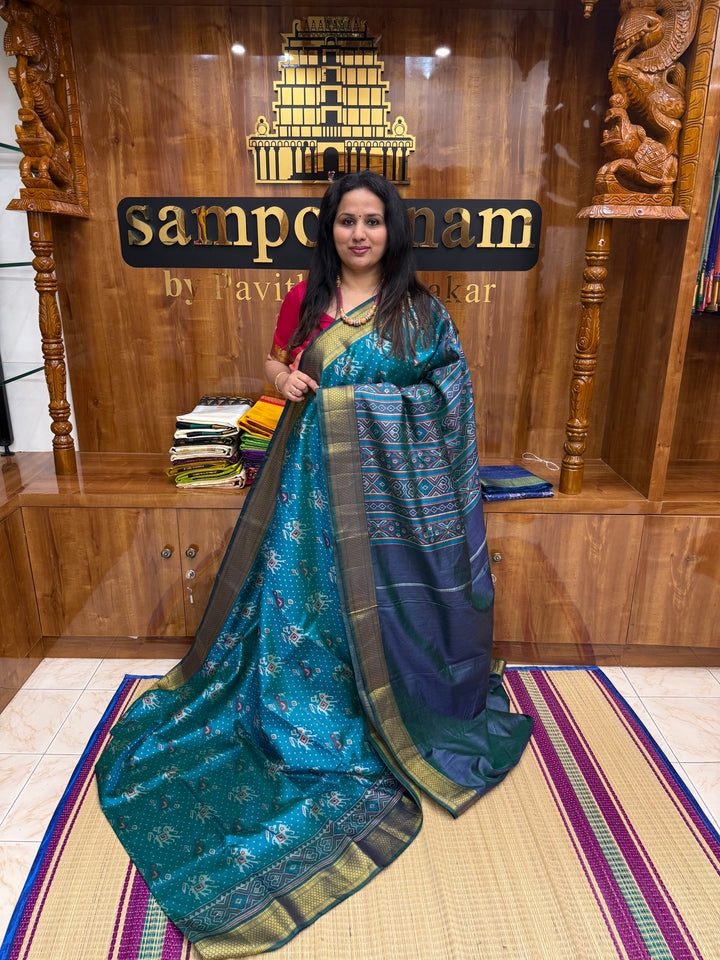 Turquoise Blue with Green  , Pochampally inspired designs in the body and traditional Kanchi Pallu , Semi Pochampally Silk Saree