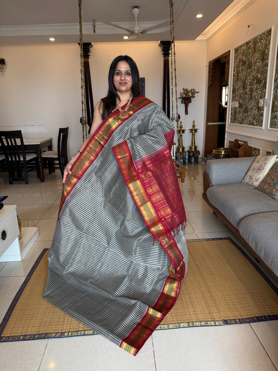 Black and White Podi Kattam with Red, traditional borders and rich Pallu Korvai Silk Cotton Saree