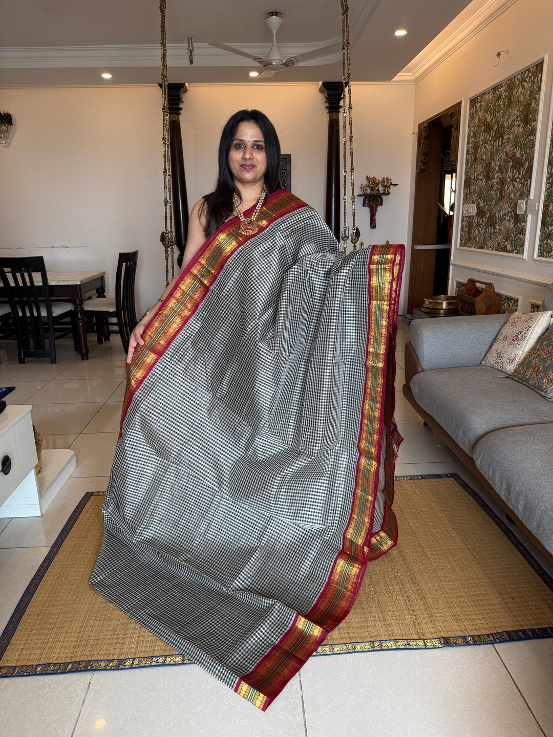 Black and White Podi Kattam with Red, traditional borders and rich Pallu Korvai Silk Cotton Saree