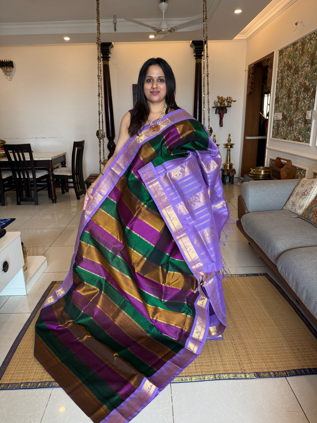 A Fusion of colours Green , Purple and Vendhayam with Lavender , traditional borders and rich Pallu Korvai Silk Cotton Saree