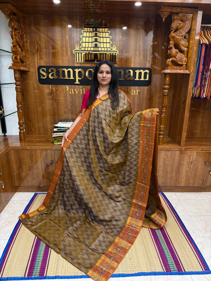 Brown with Orange ,  Pochampally inspired designs in the body and traditional Kanchi Pallu , Semi Pochampally Silk Saree