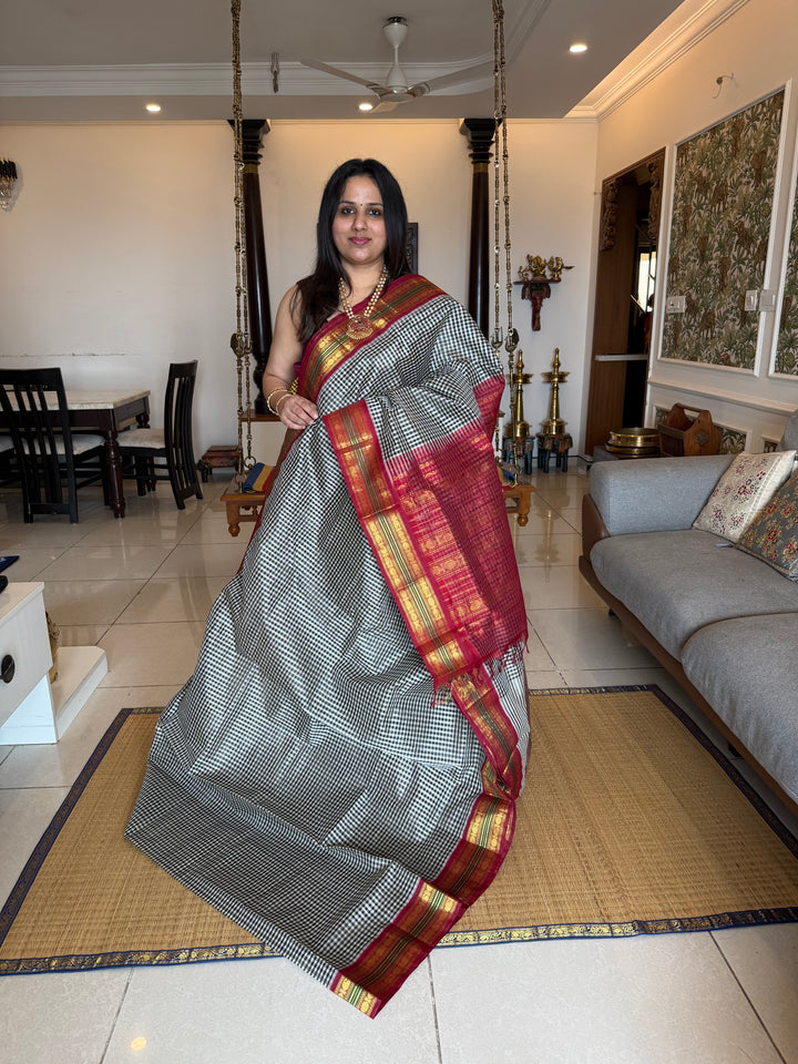 Black and White Podi Kattam with Red, traditional borders and rich Pallu Korvai Silk Cotton Saree
