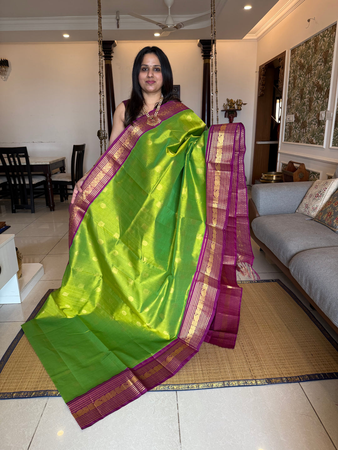 Parrot Green with Purple , rich Zari butta in the body , traditional rich Kanchi borders  and grand Pallu  Korvai Silk Cotton Saree