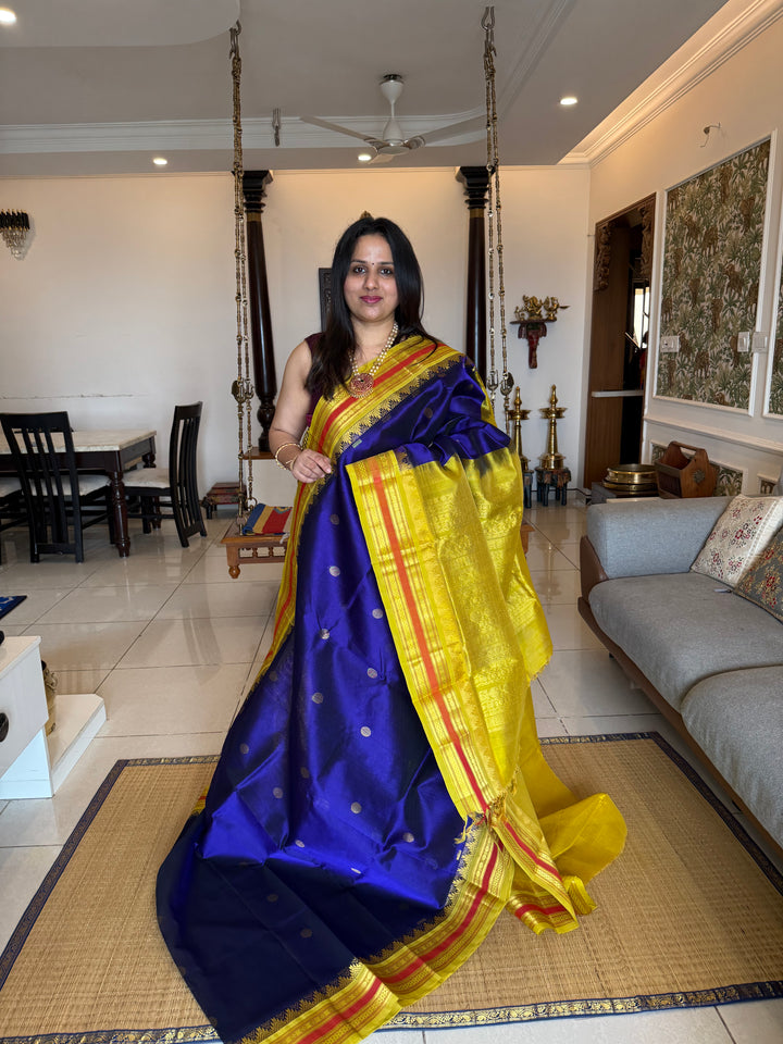 Dark Blue with Lemon Yellow , rich butta in the body , traditional borders and rich Pallu  Korvai Silk Cotton Saree
