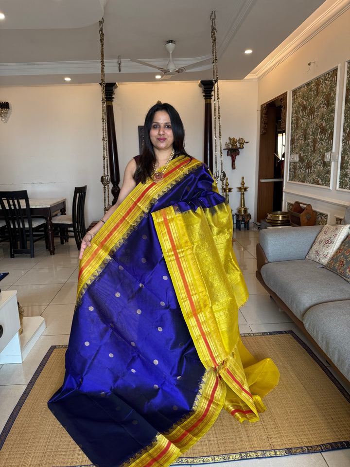 Dark Blue with Lemon Yellow , rich butta in the body , traditional borders and rich Pallu  Korvai Silk Cotton Saree
